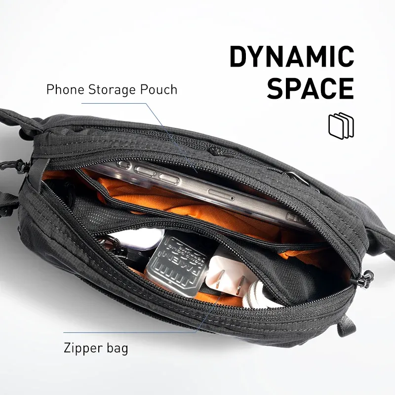 Mark Ryden compacte slingbag met USB-doorvoer